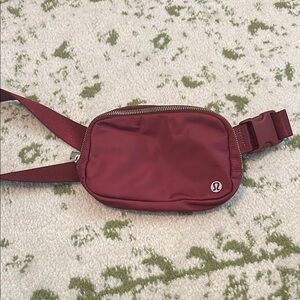 lululemon athletica Red Belt Bag with Adjustable Strap and Zipper Closure